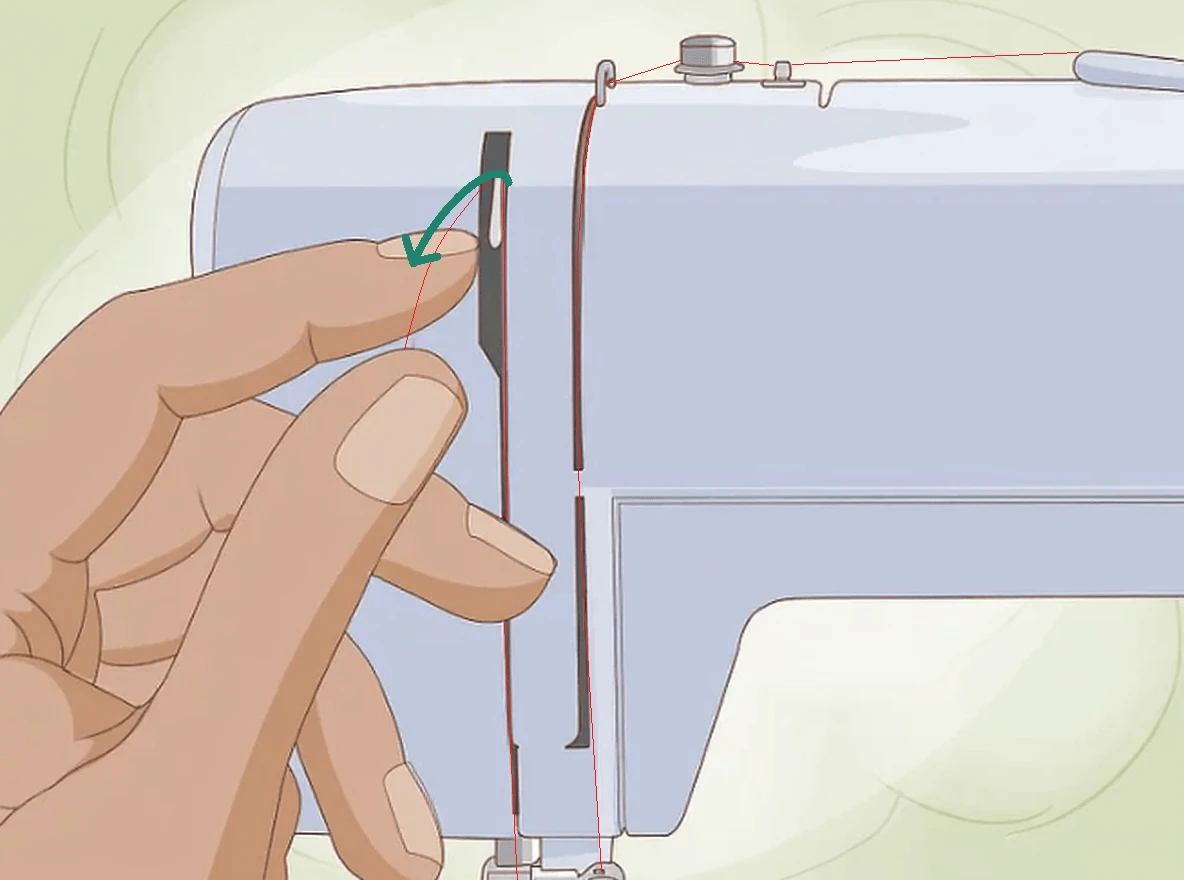 Pull the thread down and through the thread guide above the needle