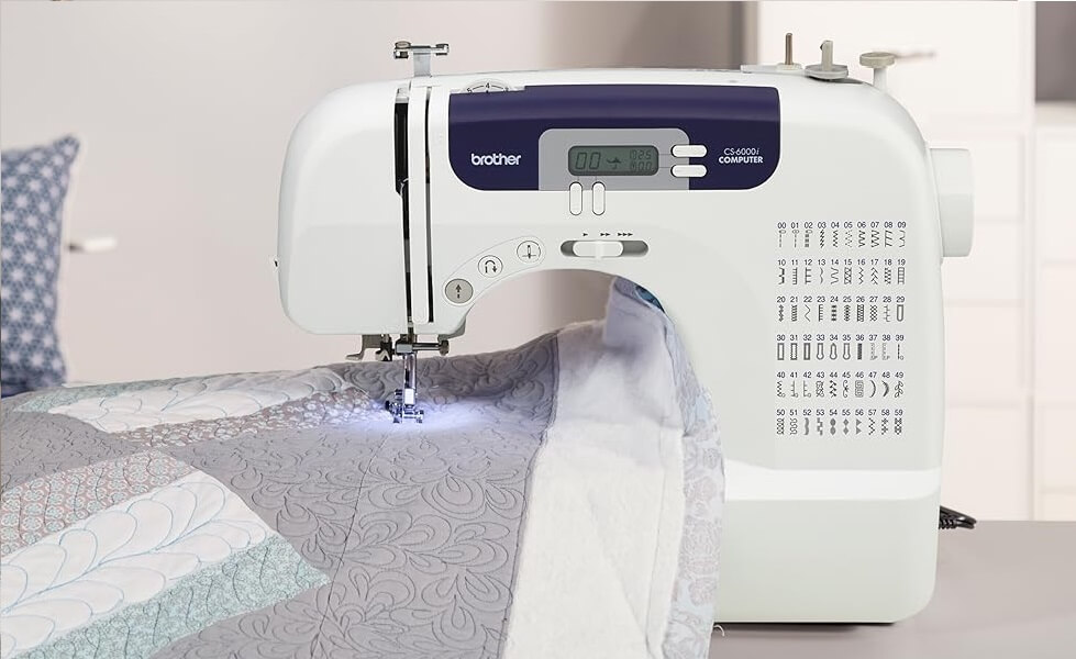 Image of the Brother CS6000i computerized sewing machine, showing its digital screen and various stitch options.