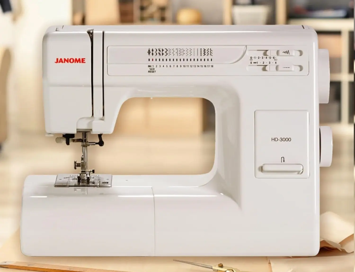 The Janome HD3000 heavy-duty sewing machine, highlighting its sturdy black and white body.